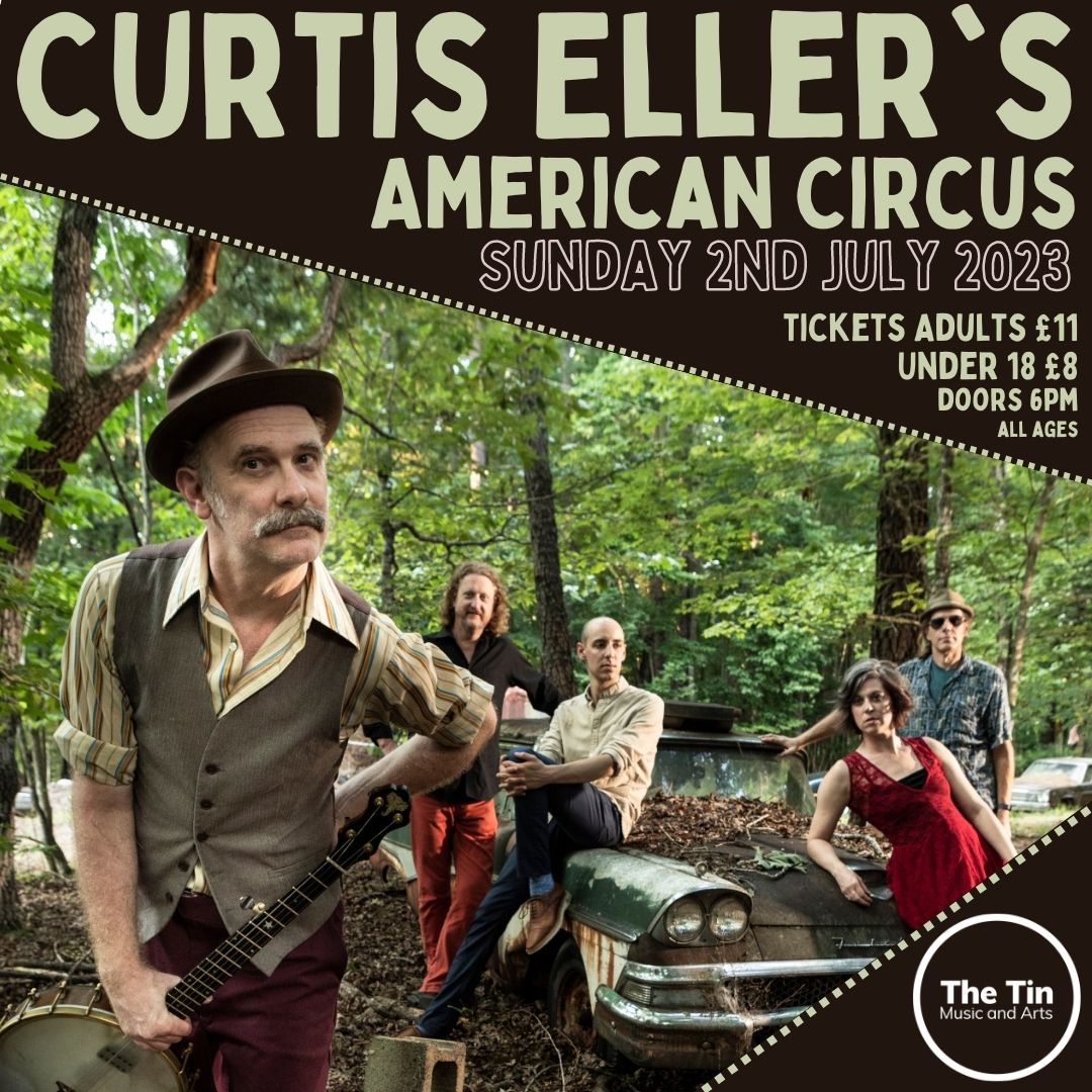 A poster for a concert by Curtis Eller's American Circus at The Tin Music and Arts on Sunday 2nd July 2023. In the foreground is a moustached man wearing a hat and holding a banjo. In the background, four people lean on a rusty car that's covered in twigs.